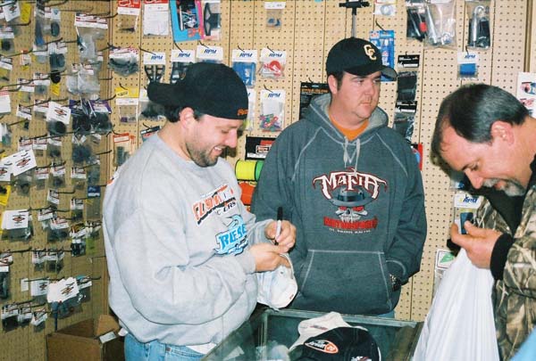 Tony Stewart signed autograph's in the Hobby shop  Photo by Danny Southard